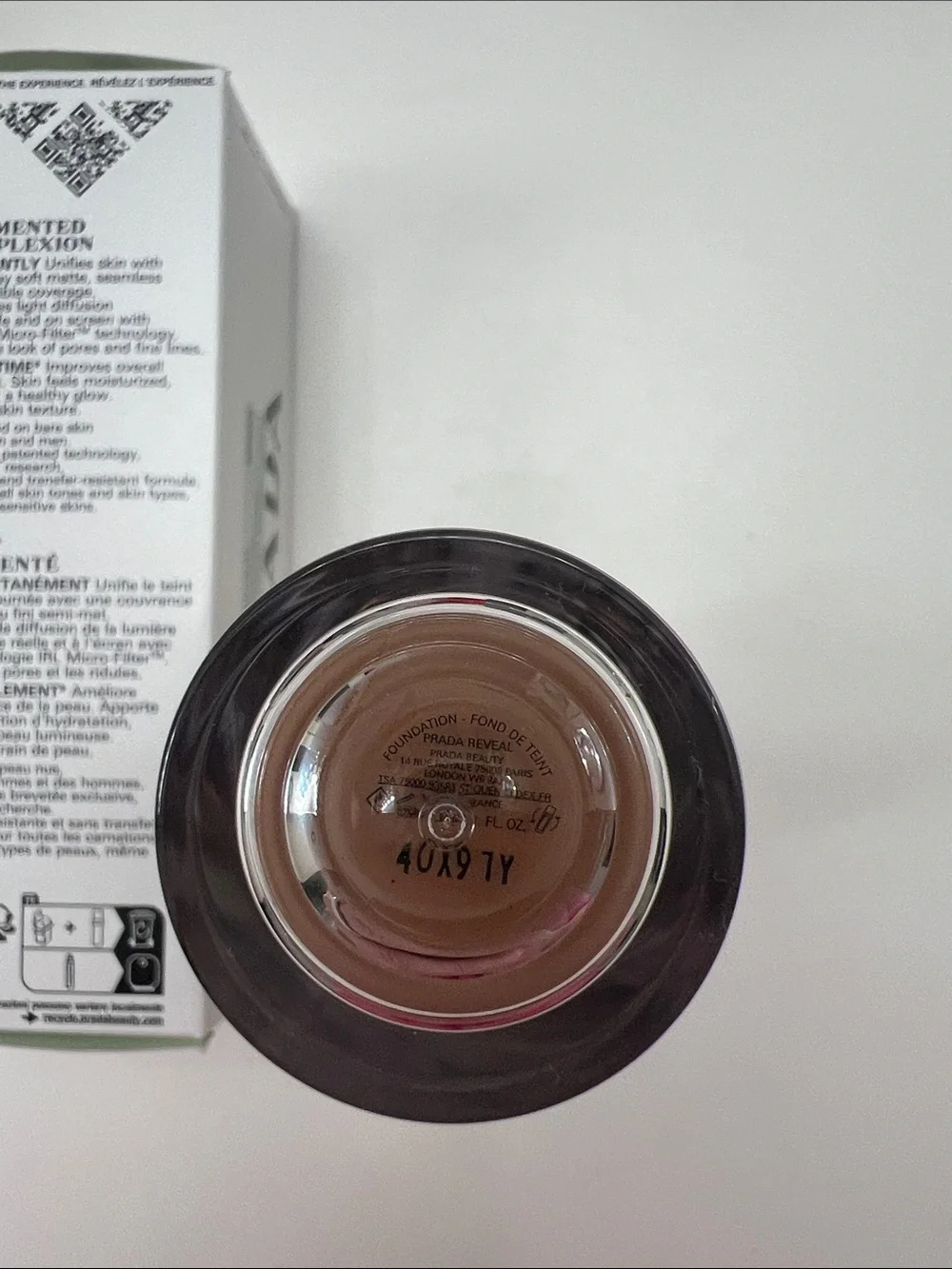 PRADA REVEAL skin optimizing foundation Lactobacillus, niacinamide, Vit E, MN55